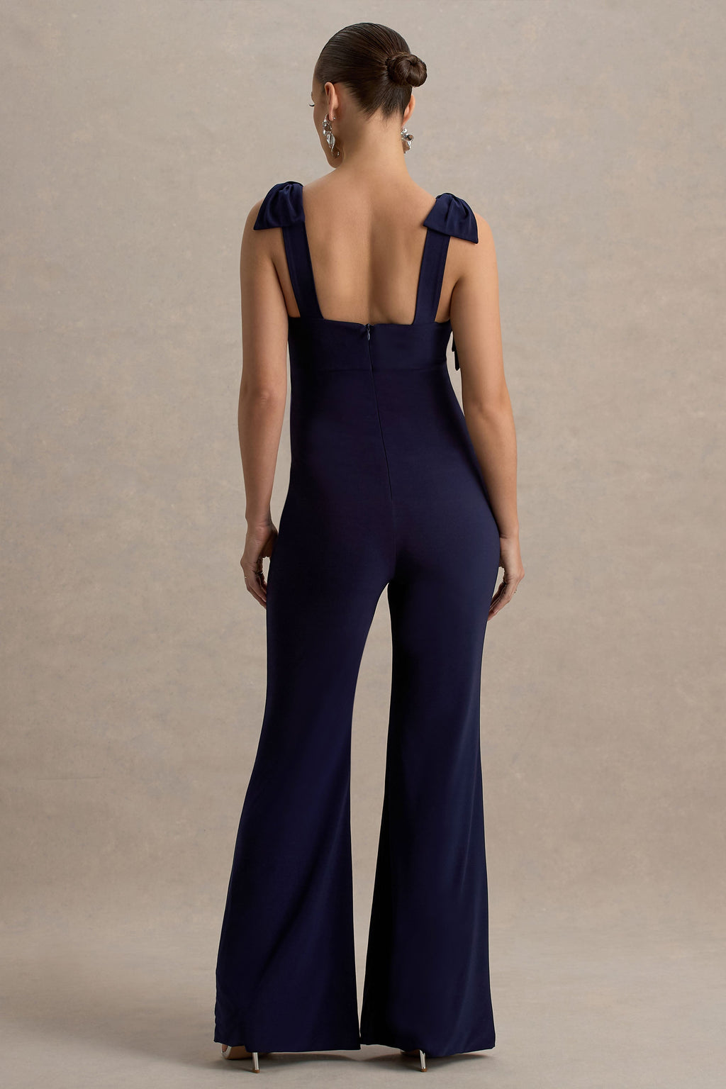 Driftly | Impeccable Navy Sweetheart Bow Strap Maternity Jumpsuit