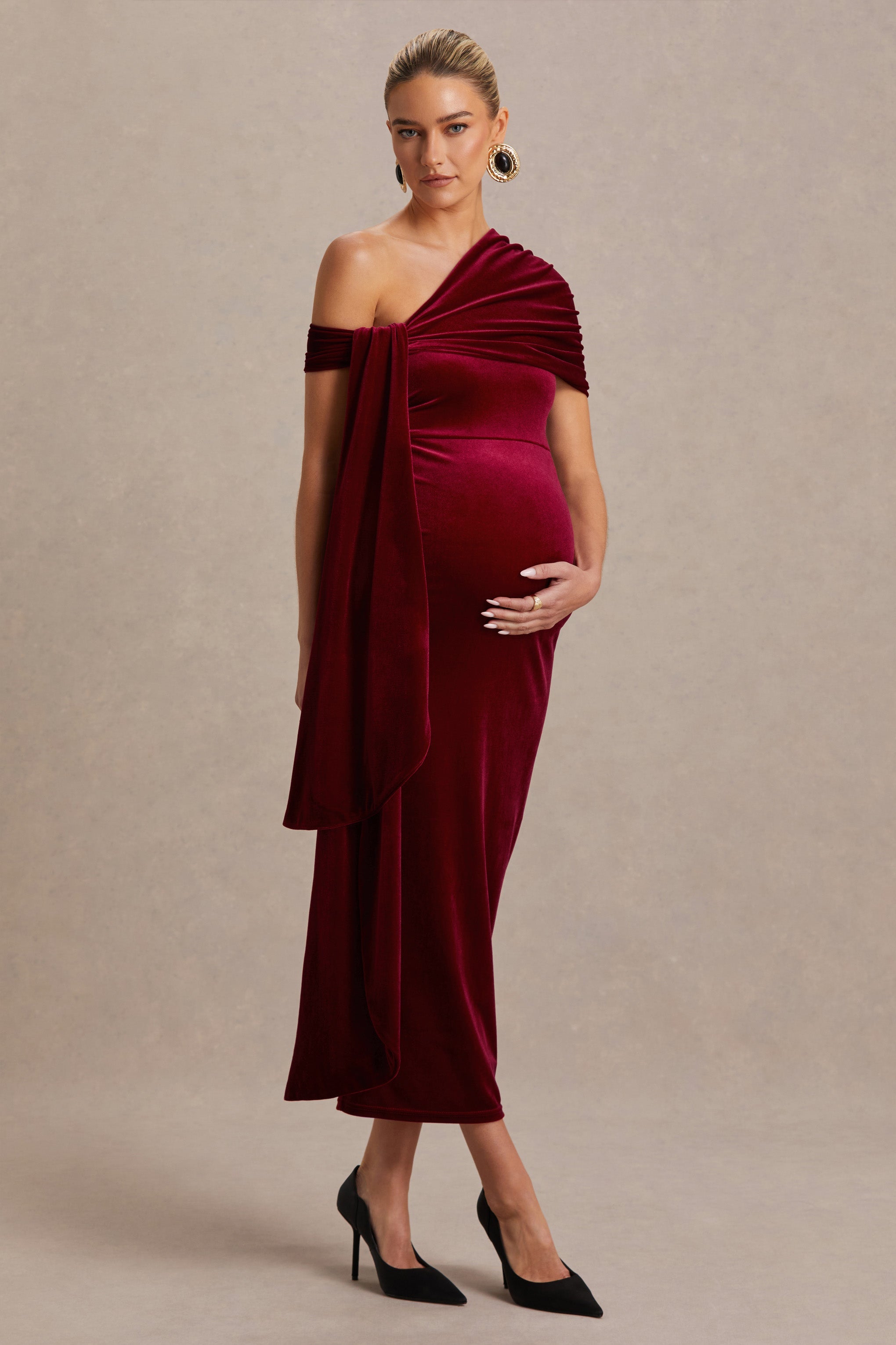 Zena Burgundy Velvet Asymmetric-Neck Maternity Midi Dress With Knot And Sash Detail – side view