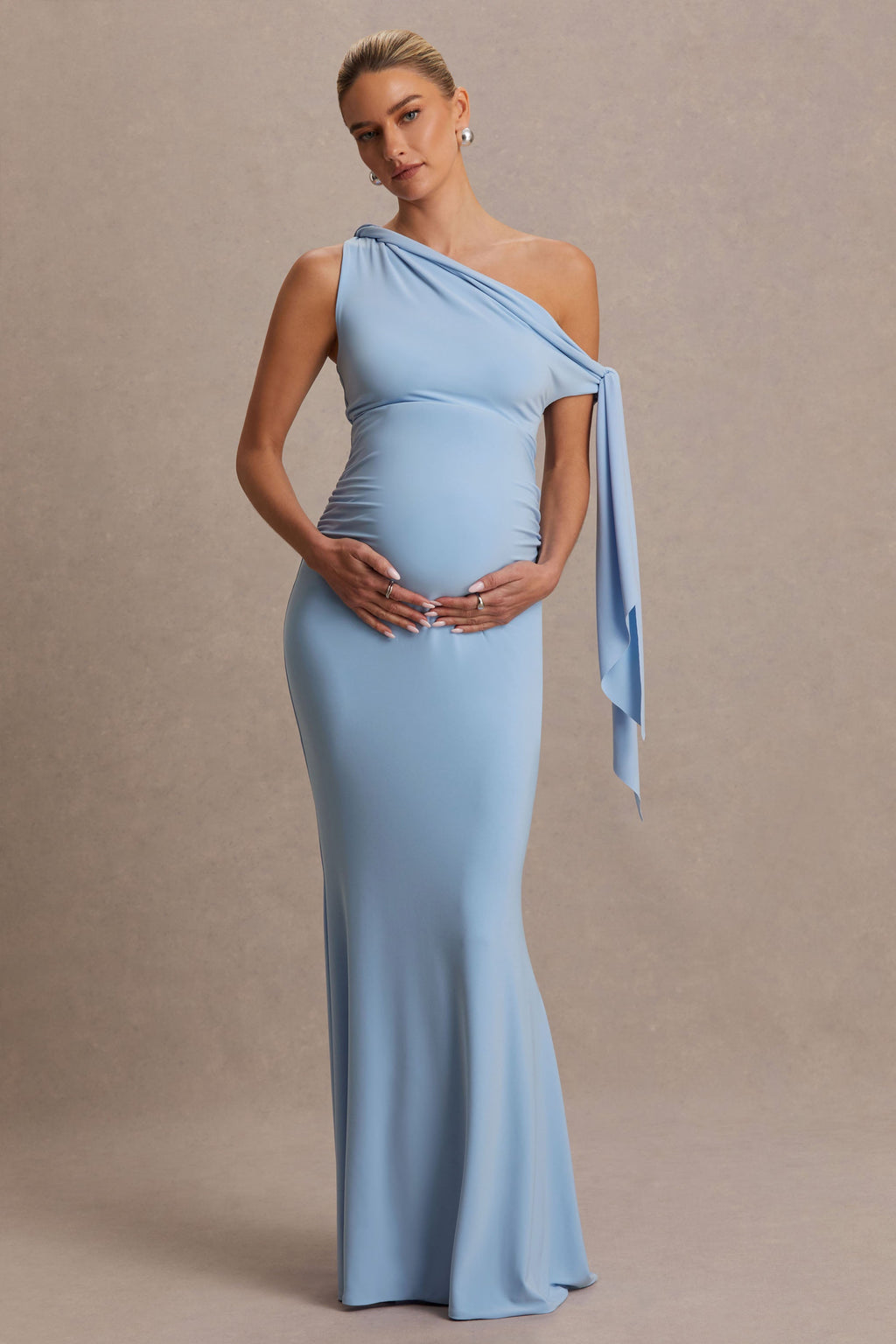 Orielle Powder Blue Asymmetric-Neck Maternity Maxi Dress With Knot-Sleeve And Sash – front view