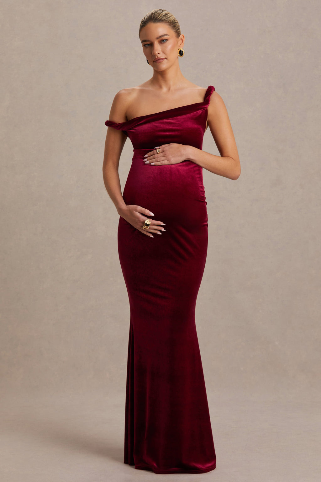 Tallulah Burgundy Velvet Asymmetric-Neck Maternity Maxi Dress With Twist-Sleeve – front view