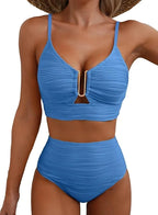Woman wearing a apricot pink high-waisted elegant bikini set - lifestyle photo
