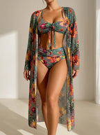 Driftly gray deep V-neck halter bikini set with high-waisted bottoms, in a minimalist studio setting with soft window light.