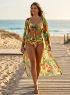 Driftly yellow deep V-neck halter bikini set with high-waisted bottoms, walking on a sandy beach boardwalk at golden hour.