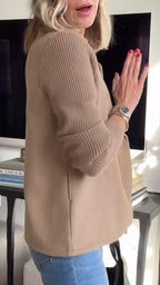 Woman wearing a brown knit double-breasted blazer - mirror selfie style photo