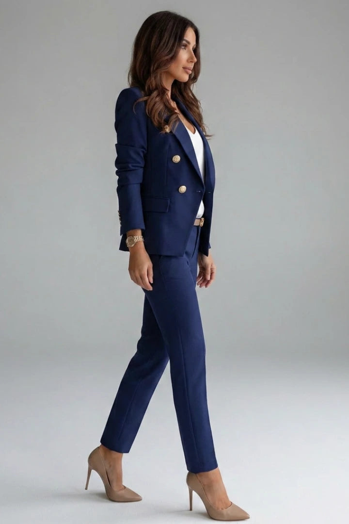 Woman wearing a navy blue double-breasted button office blazer set - studio photo
