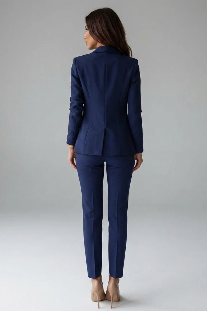 Woman wearing a navy blue double-breasted button office blazer set - studio photo