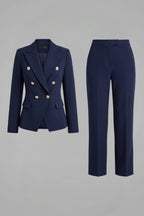 Woman wearing a navy blue double-breasted button office blazer set - studio photo