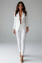Woman wearing a white double-breasted button office blazer set - studio photo