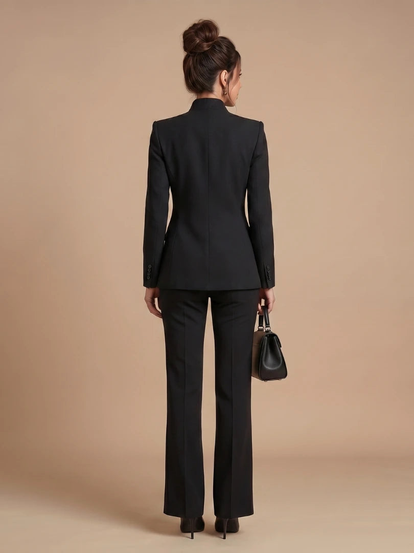 Woman wearing a black structured stand collar tailored blazer - lifestyle photo