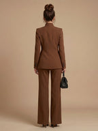 Woman wearing a brown structured stand collar tailored blazer - lifestyle photo
