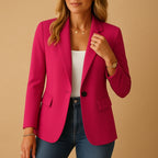 Woman wearing a pink tailored single-breasted blazer - lifestyle photo