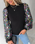 Driftly balloon sleeve sequin blouse in black, side view