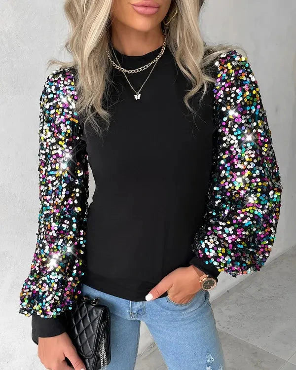 Driftly balloon sleeve sequin blouse in black, sleeve detail