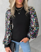Driftly balloon sleeve sequin blouse in black, sleeve detail