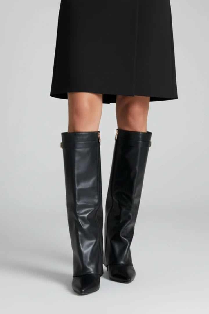 Woman wearing a black wide opening block heel boot - studio photo