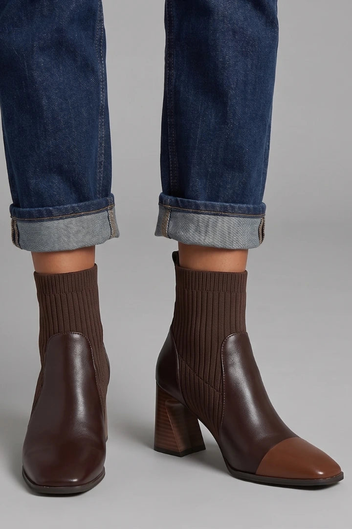 Woman wearing brown block heel ankle boots - lifestyle photo