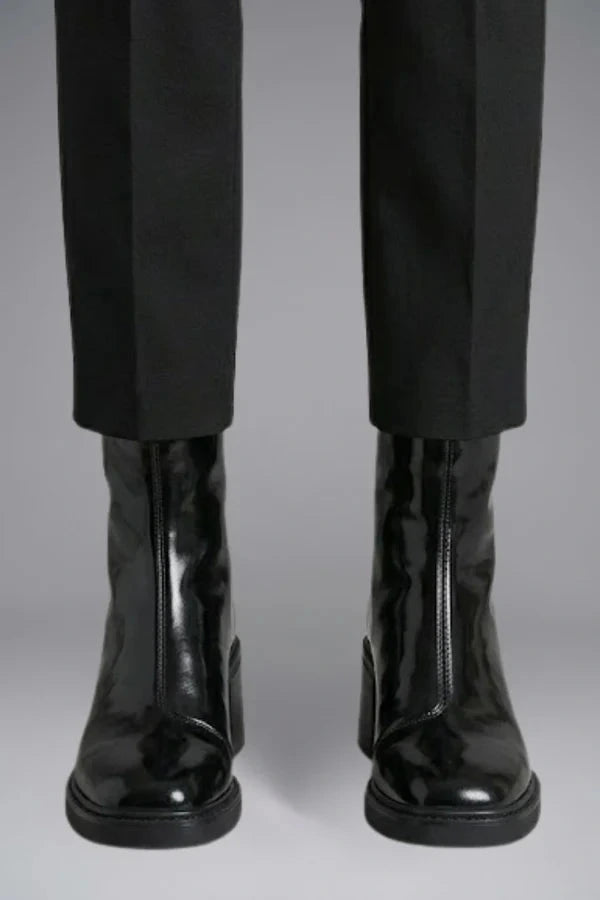 Woman wearing black block heel side zipper ankle boots - lifestyle photo