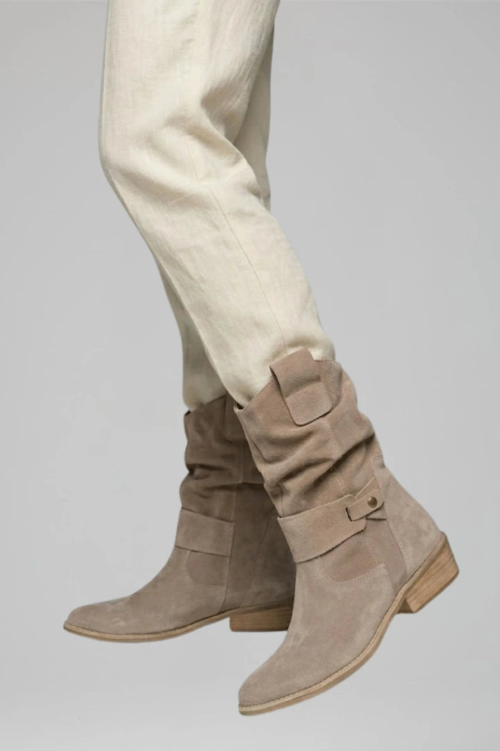 Woman wearing beige mid-calf side zipper boots - lifestyle photo