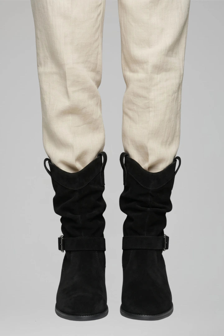 Woman wearing black mid-calf side zipper boots - lifestyle photo