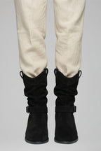 Woman wearing black mid-calf side zipper boots - lifestyle photo