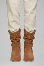 Woman wearing brown mid-calf side zipper boots - lifestyle photo