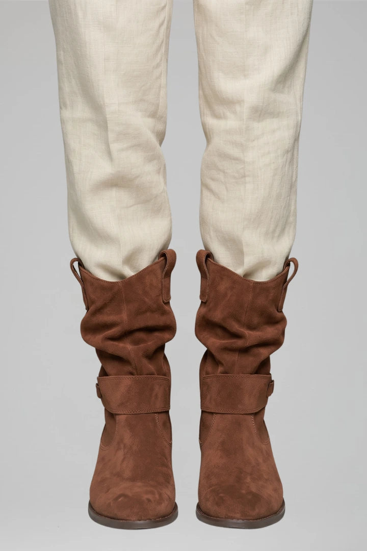 Woman wearing dark brown mid-calf side zipper boots - lifestyle photo