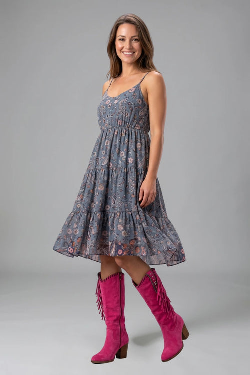 Woman wearing pink orthopedic block heel boots - lifestyle photo