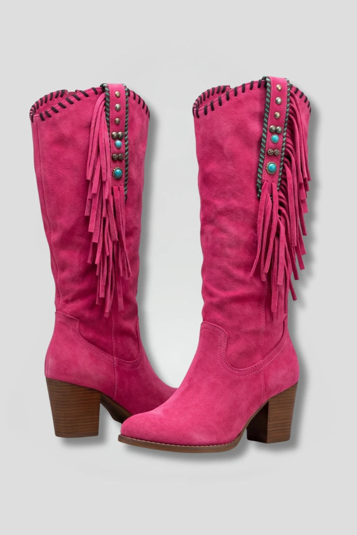 Woman wearing pink orthopedic block heel boots - studio photo