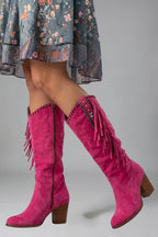 Woman wearing red orthopedic block heel boots - studio photo