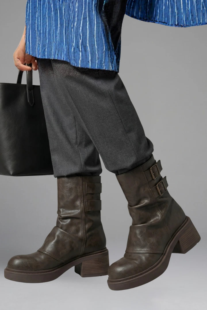 Woman wearing black side buckle accent fall boots - lifestyle photo