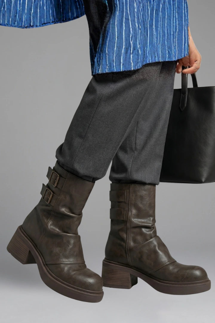 Woman wearing black side buckle accent fall boots - lifestyle photo