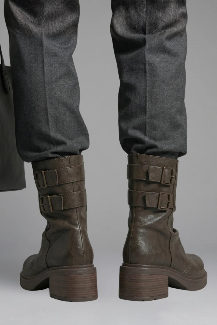 Woman wearing brown side buckle accent fall boots - lifestyle photo