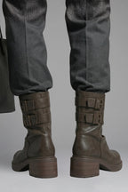 Woman wearing brown side buckle accent fall boots - lifestyle photo