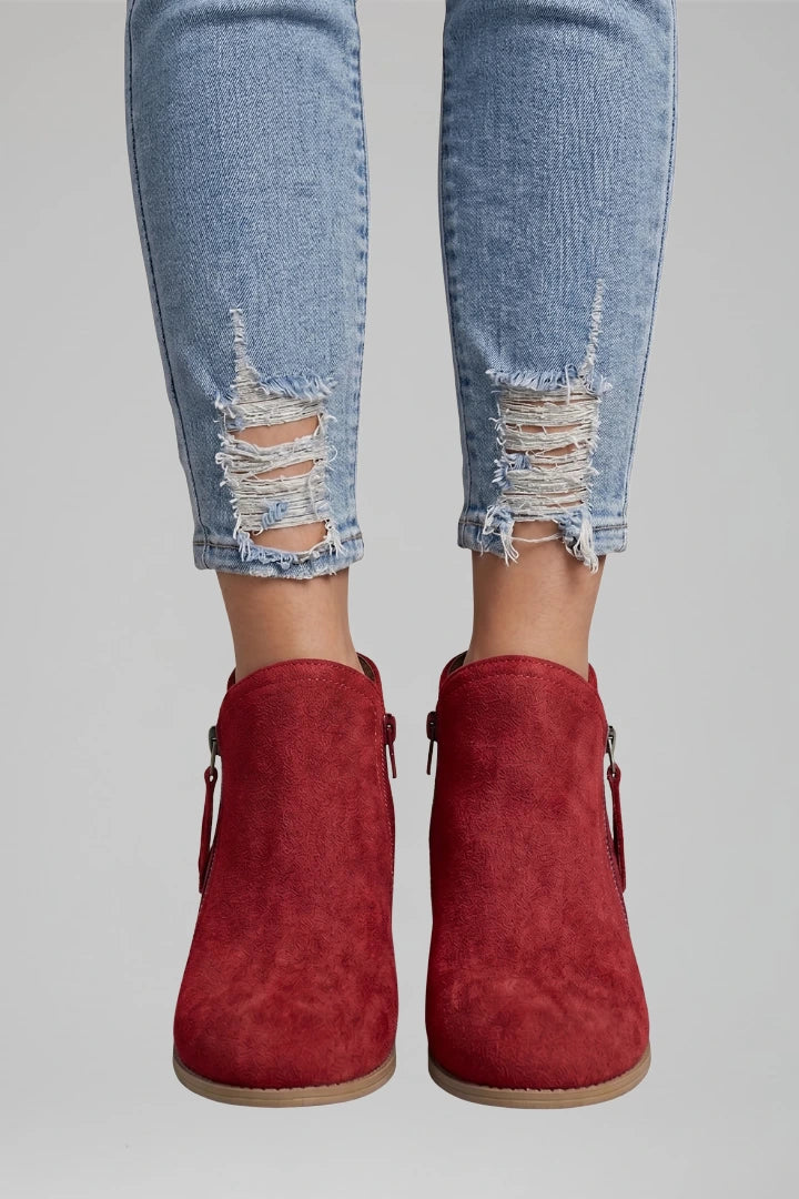 Woman wearing red suede side zipper ankle boots - lifestyle photo