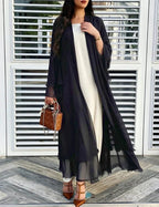 Black sheer chiffon open front long cardigan on model