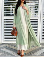 Green sheer chiffon open front long cardigan on model