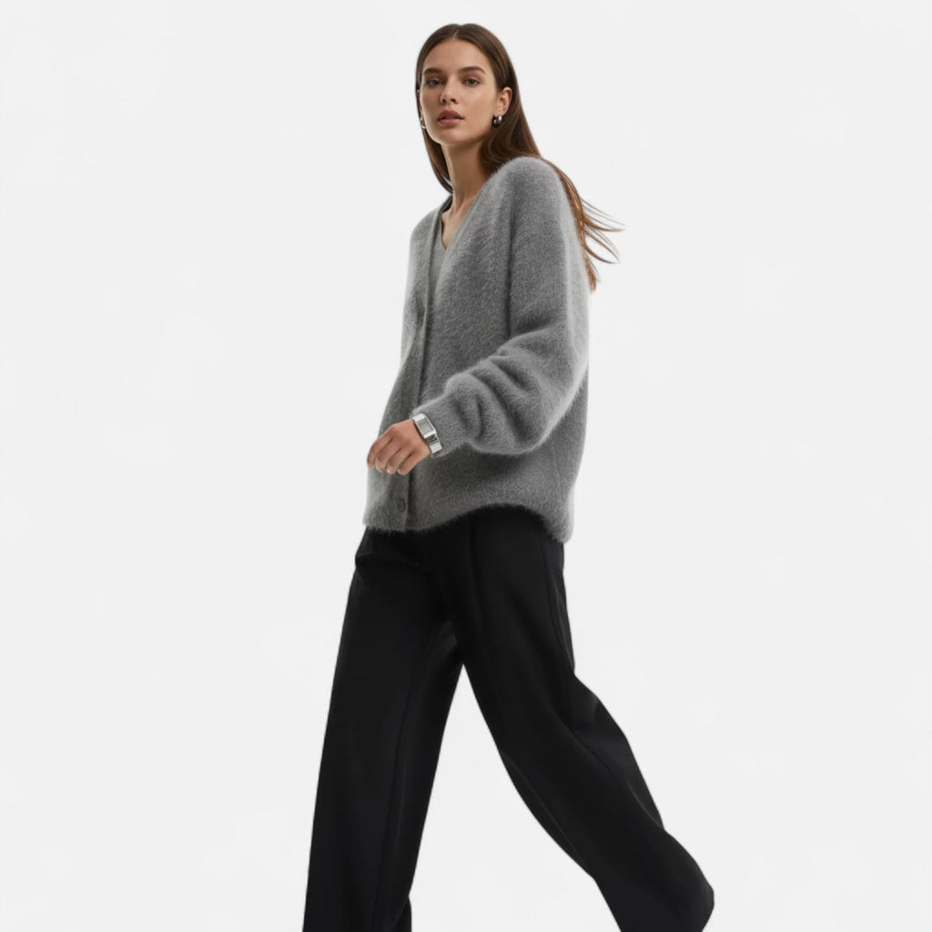 Grey knit cardigan worn by model