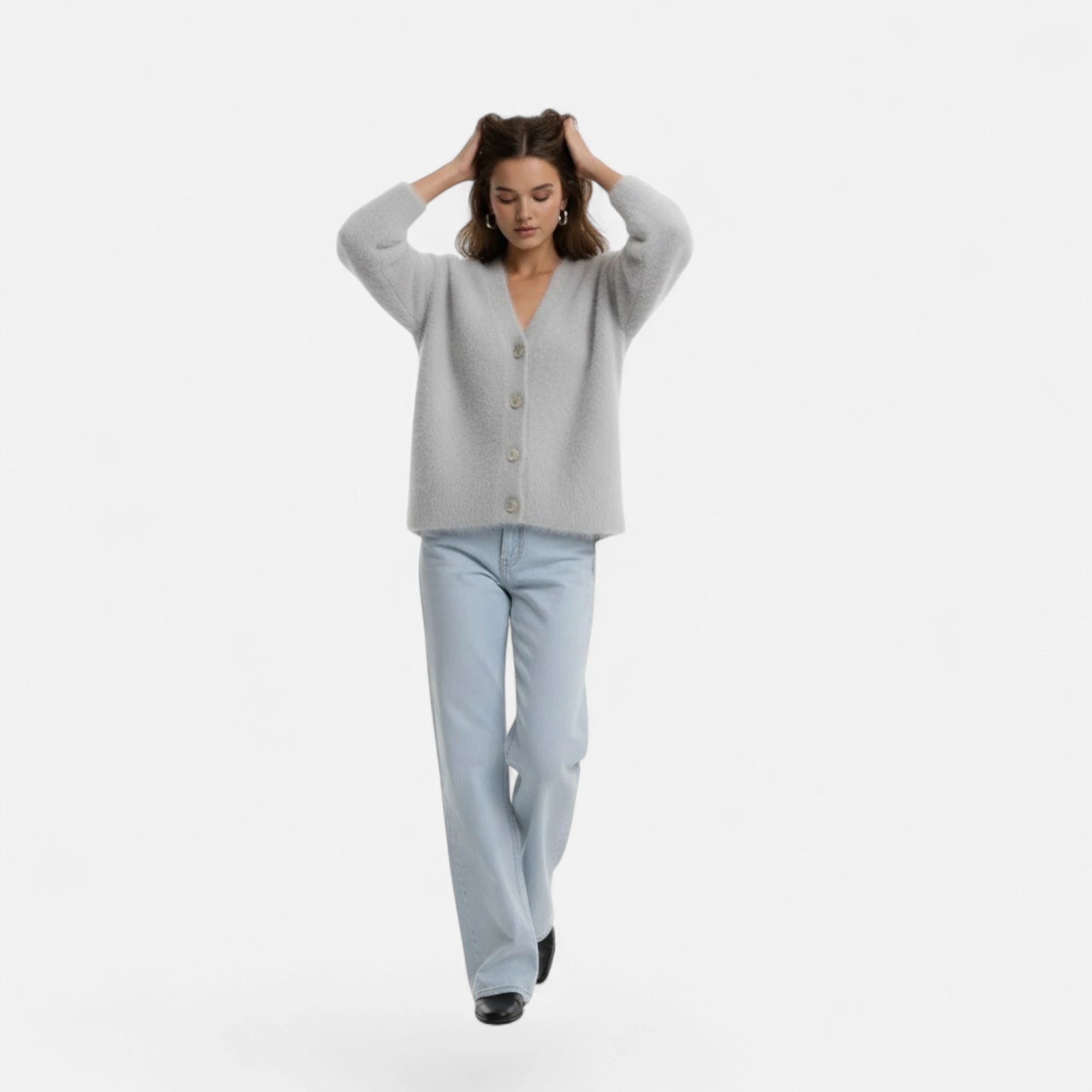 Light grey knit cardigan worn by model