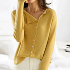 Mustard yellow asymmetric button-front knit cardigan on model