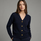 Driftly V-neck heart button cardigan in navy blue, worn by model