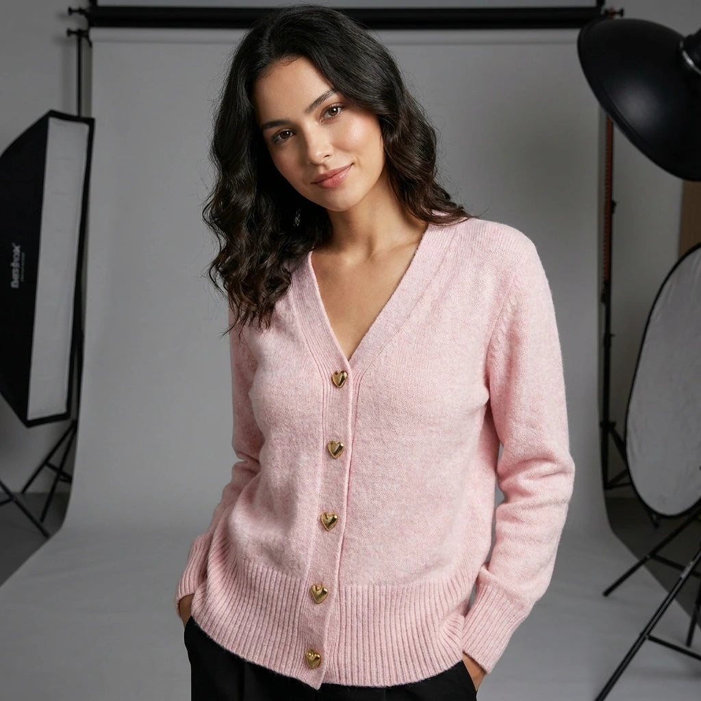 Driftly V-neck heart button cardigan in pink, studio shot