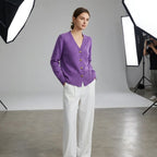Driftly V-neck heart button cardigan in purple, worn by model