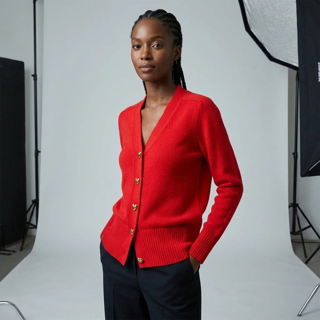 Driftly V-neck heart button cardigan in red, studio shot