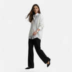 White loose V-neck buttoned knit cardigan, front view