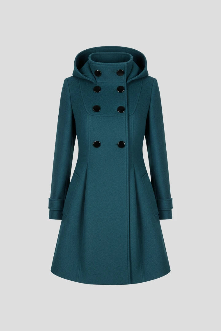 Woman wearing a green hooded double button-front coat - studio photo