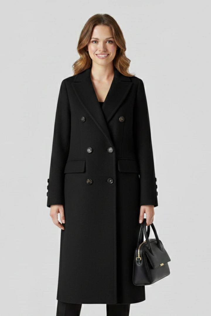 Woman wearing a black lapel collar button-down coat - studio photo