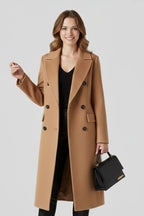 Woman wearing a brown lapel collar button-down coat - studio photo