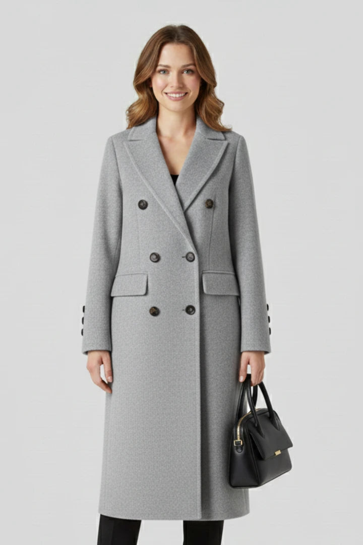 Woman wearing a grey lapel collar button-down coat - studio photo