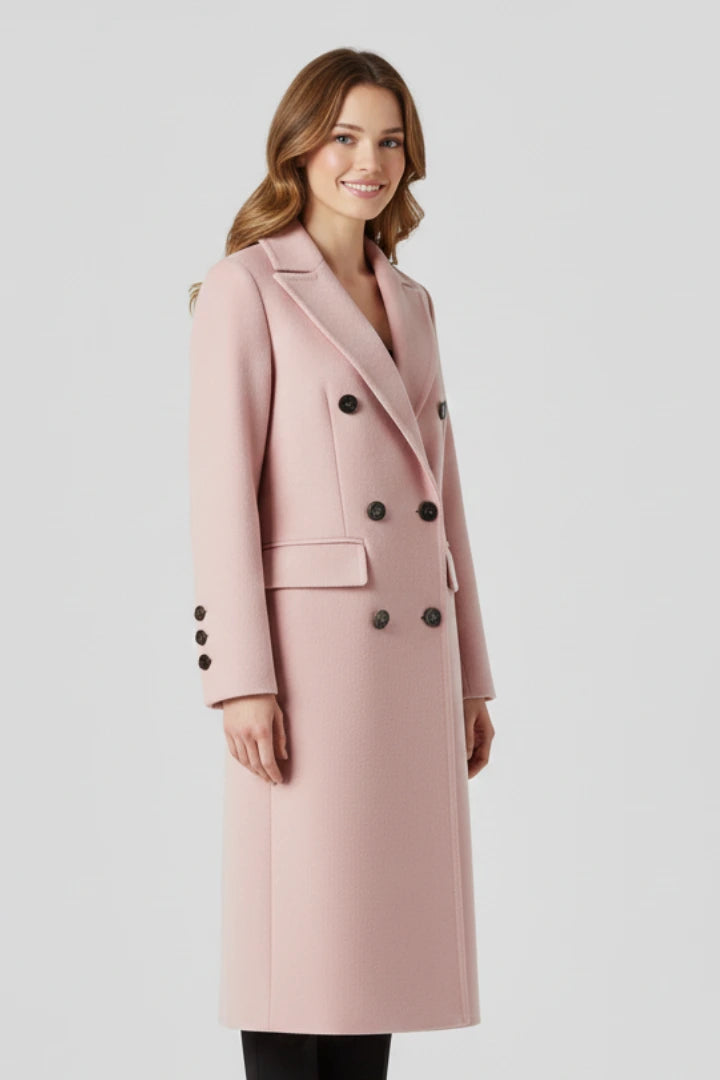 Woman wearing a pink lapel collar button-down coat - studio photo