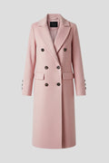 Woman wearing a pink lapel collar button-down coat - studio photo